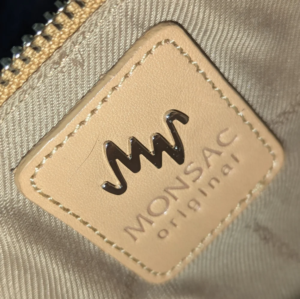 Monsac tan leather bag.